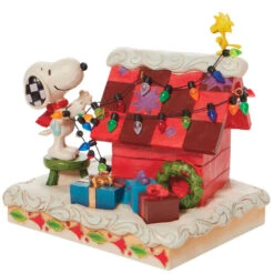 Enesco Jim Shore Peanuts Snoopy With Woodstock Decorating Dog House, 4.8"